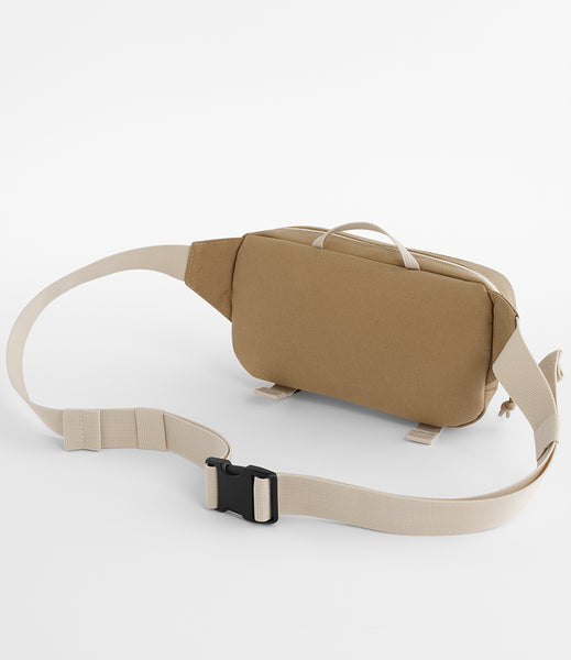 The back view of the ramble belt bag in desert sand shown on a white background 