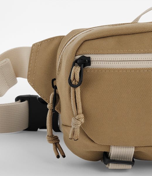 A close up of the ramble bet bag in desert sand colour 