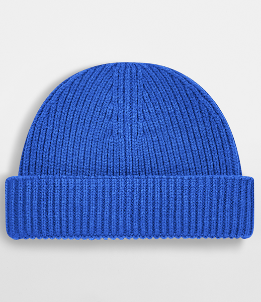 A bright blue ribbed knit beanie hat with a folded cuff, shown against a light gray background.
