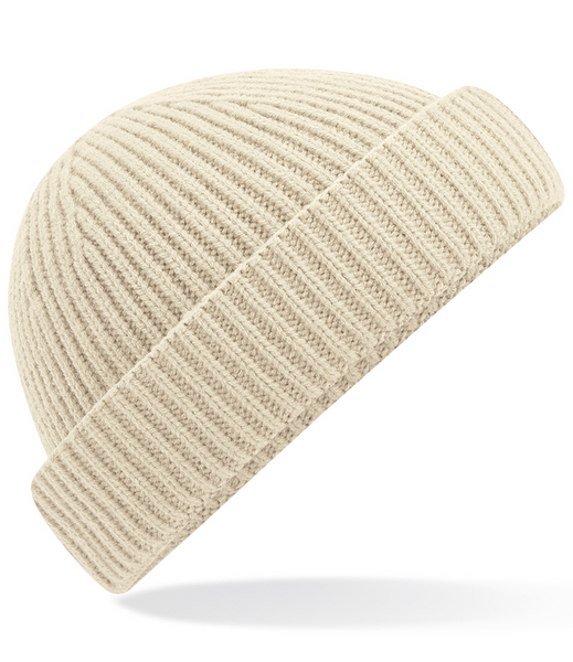 Beige knit beanie on a white background