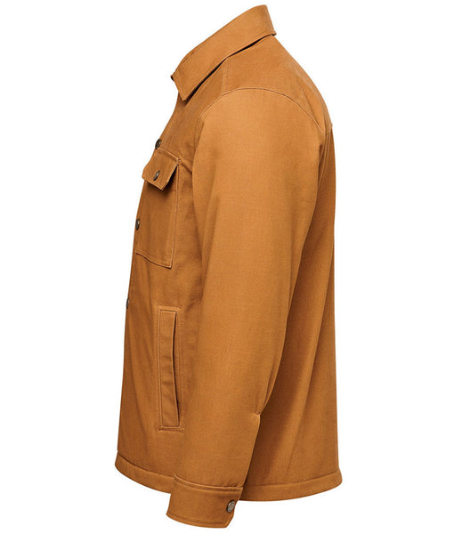 A side profile view of a tan canvas utility jacket with a pointed collar, buttoned chest pocket, and a vertical welt pocket on the lower front, shown against a plain white background.
