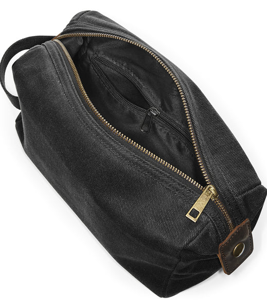 Wild Isle Waxed Canvas Wash Bag showing zip opening and internal zip pocket 