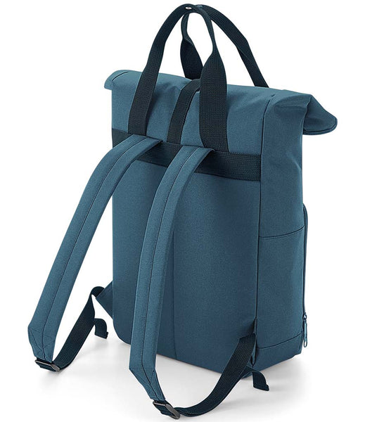 Back view of a blue back pack showing carry handles and back straps 