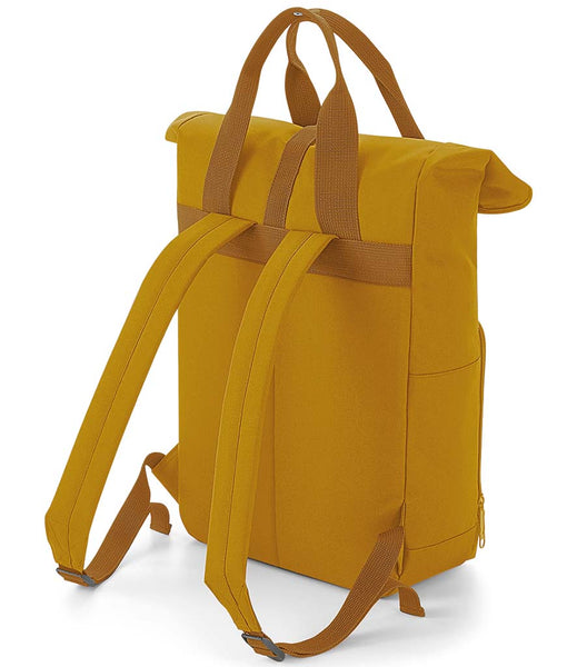 Mustard backpack with back straps and carry handle on a white background