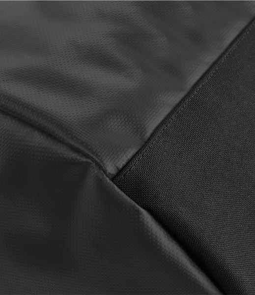 Close-up of black fabric for the wild isle tarp back pack 